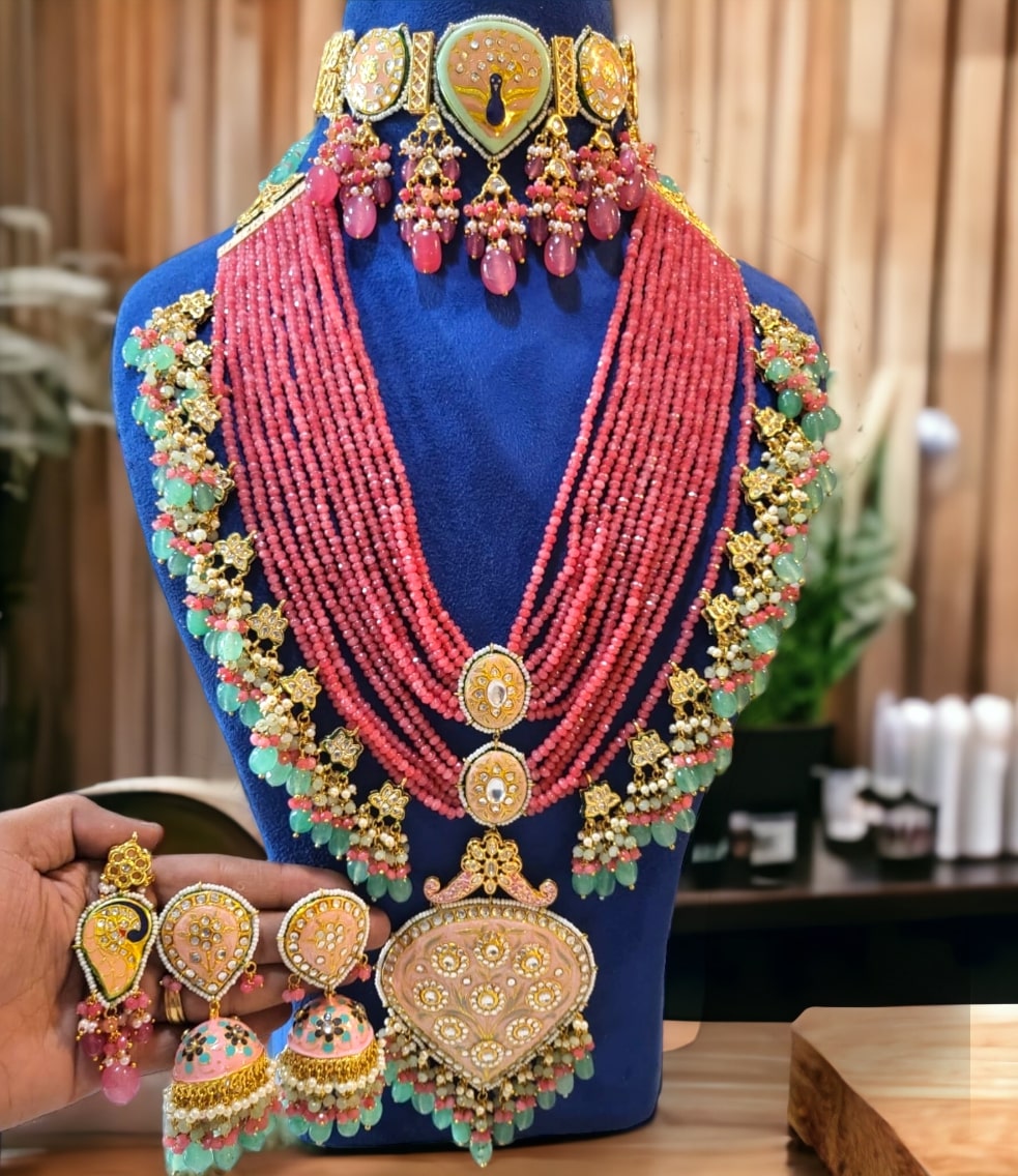 Samantha wedding set with Jhumkis and tikka in pink color