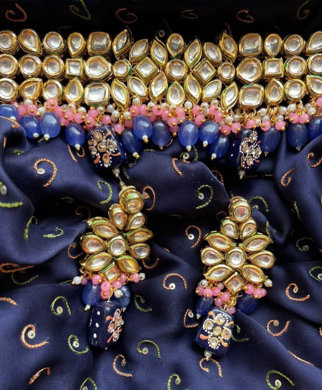 blue choker necklace and earring