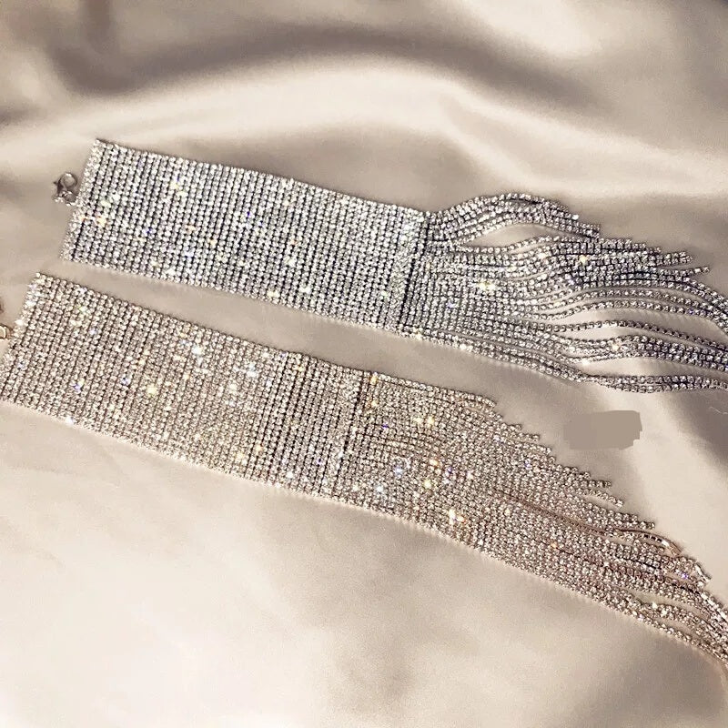 silver cocktail bracelet with white background