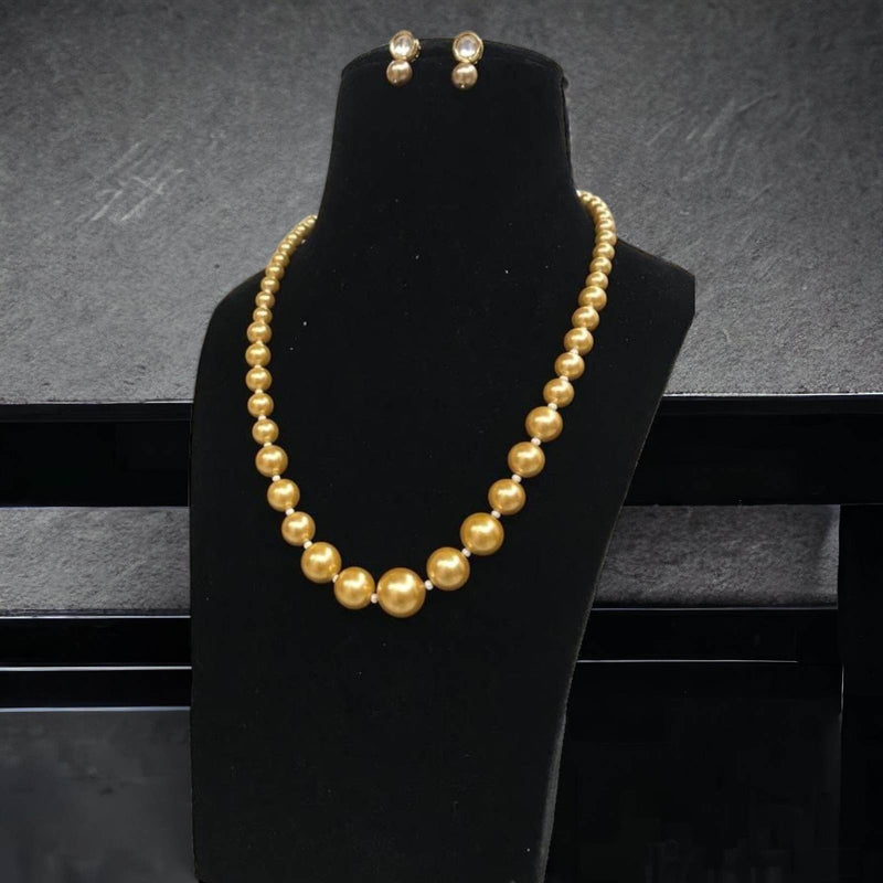 Aisha pearl necklace in gold color