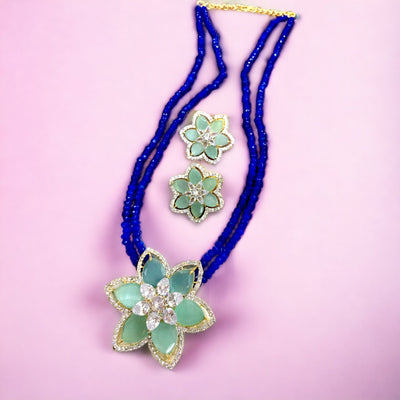 Flower broach semi-precious set in blue color