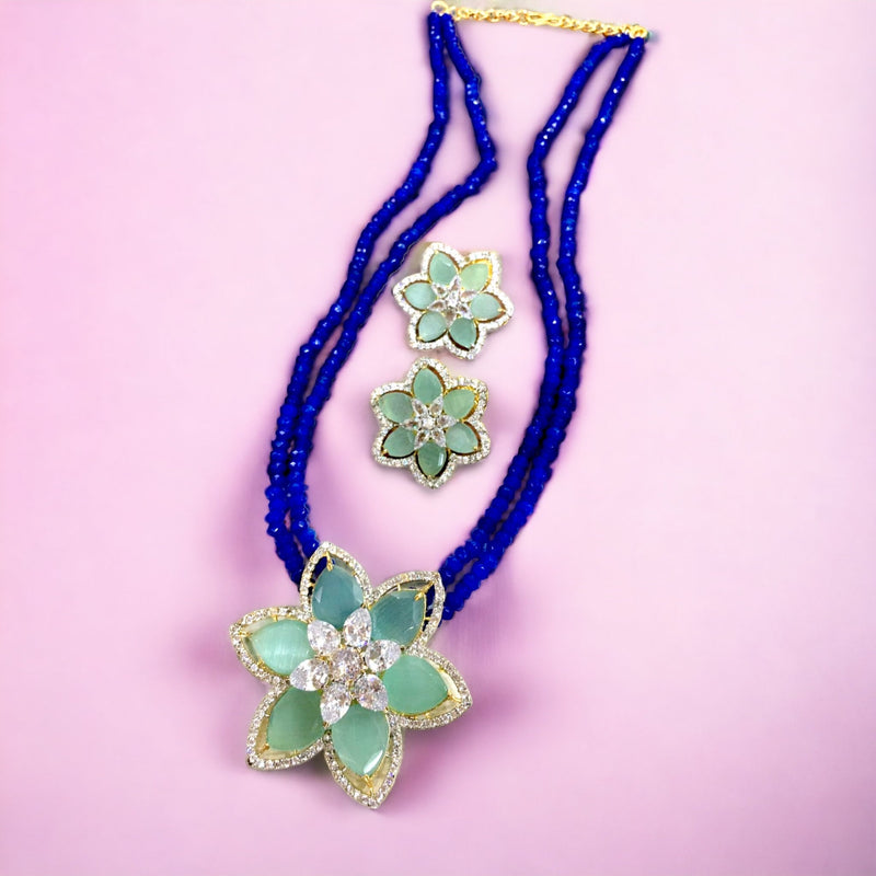 Flower broach semi-precious set in blue color