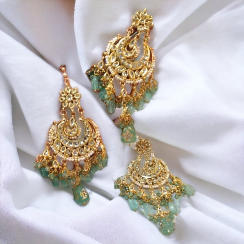 Zeenat kundan Teeka and Earrings combo in mint color is on the white background