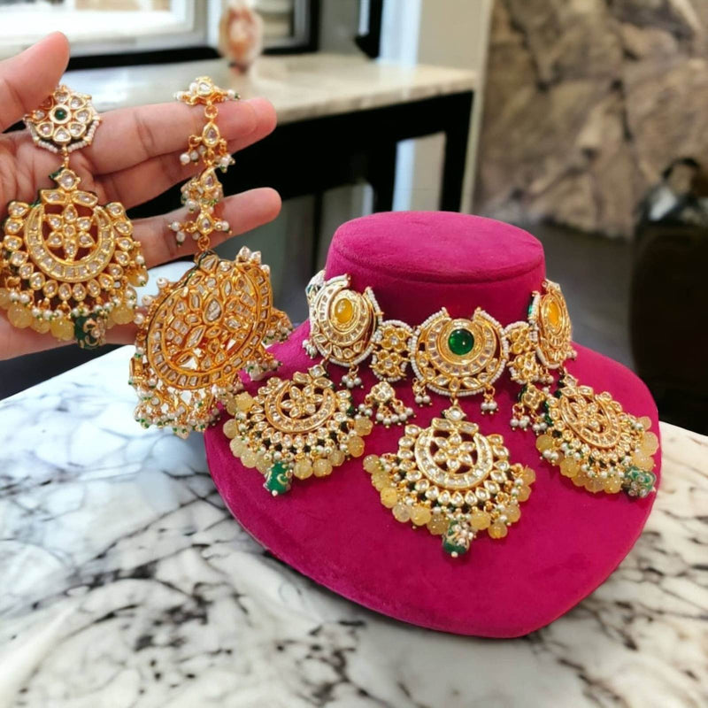 Ratna kundan necklace set with oversized tikka and chand bali style earrings in yellow color