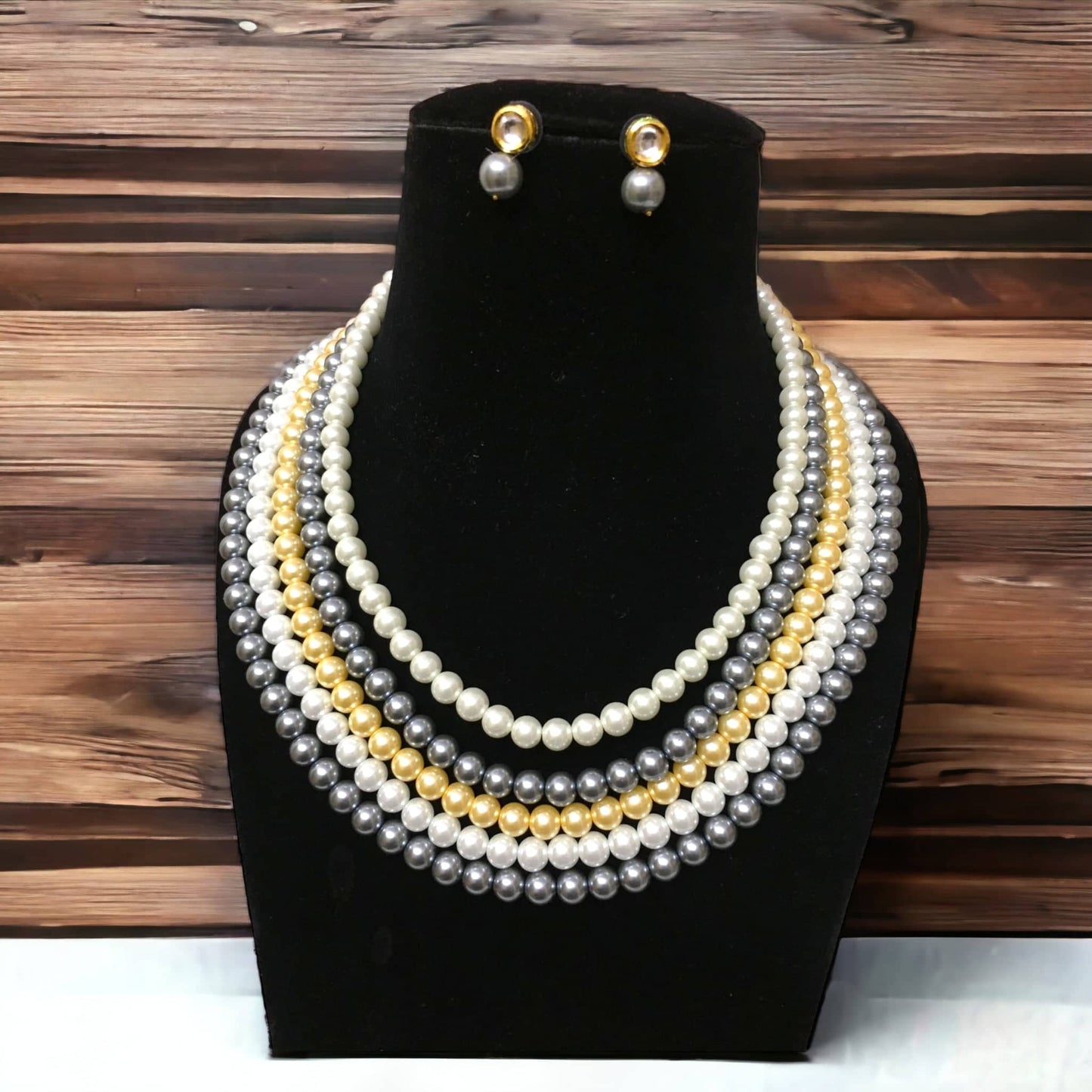 Raza 20-inch multi-colored pearl necklace features five layers with earrings