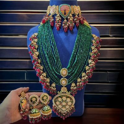 Samantha wedding set with Jhumkis and tikka in green color