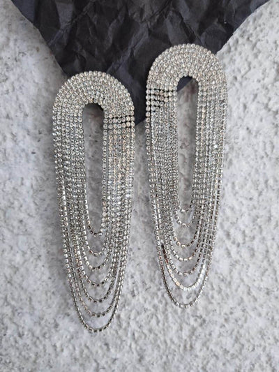 sania oversized statement dangler earrings in silver color