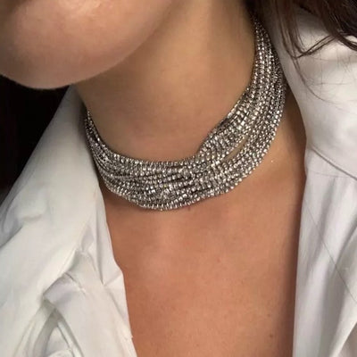 A lady wear alex choker in silver tone